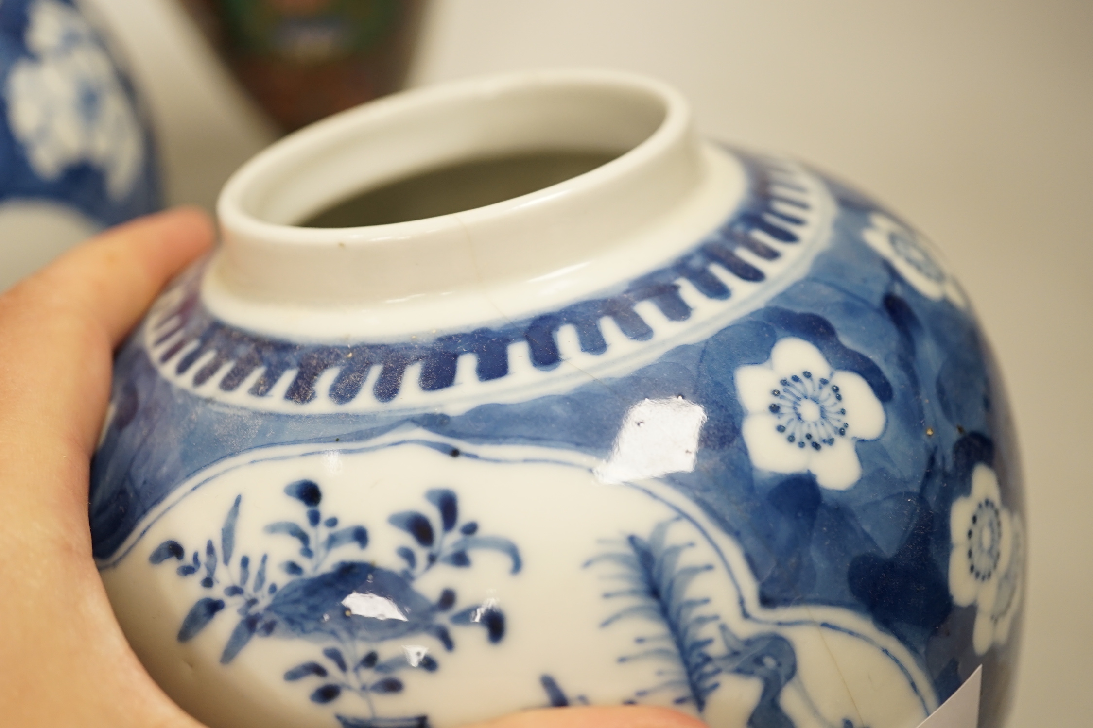 A pair of Chinese blue and white jars and associated covers and a pair of Japanese cloisonné enamel vases, cloisonné vases 21cm high